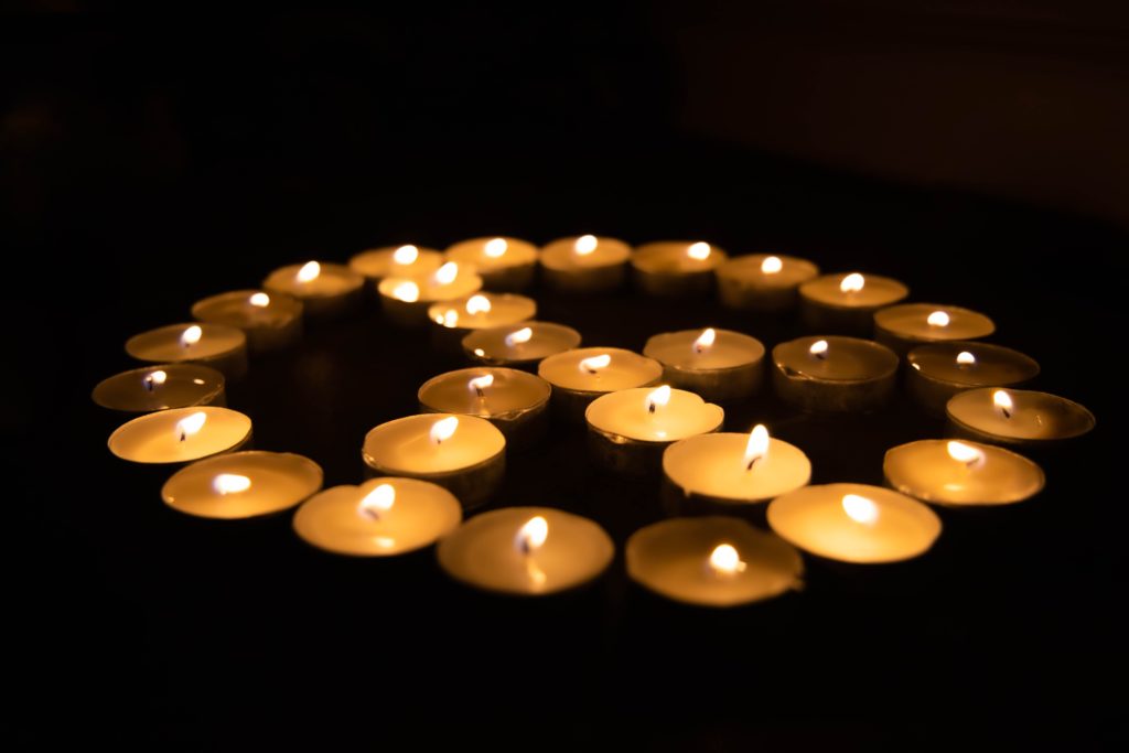 memorial candles in a peace design